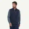man in patagonia navy vest